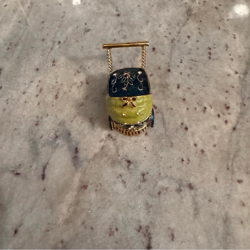 a forest green lime, green baby carriage trinket